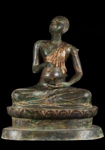 Buddhist monk with alms bowl