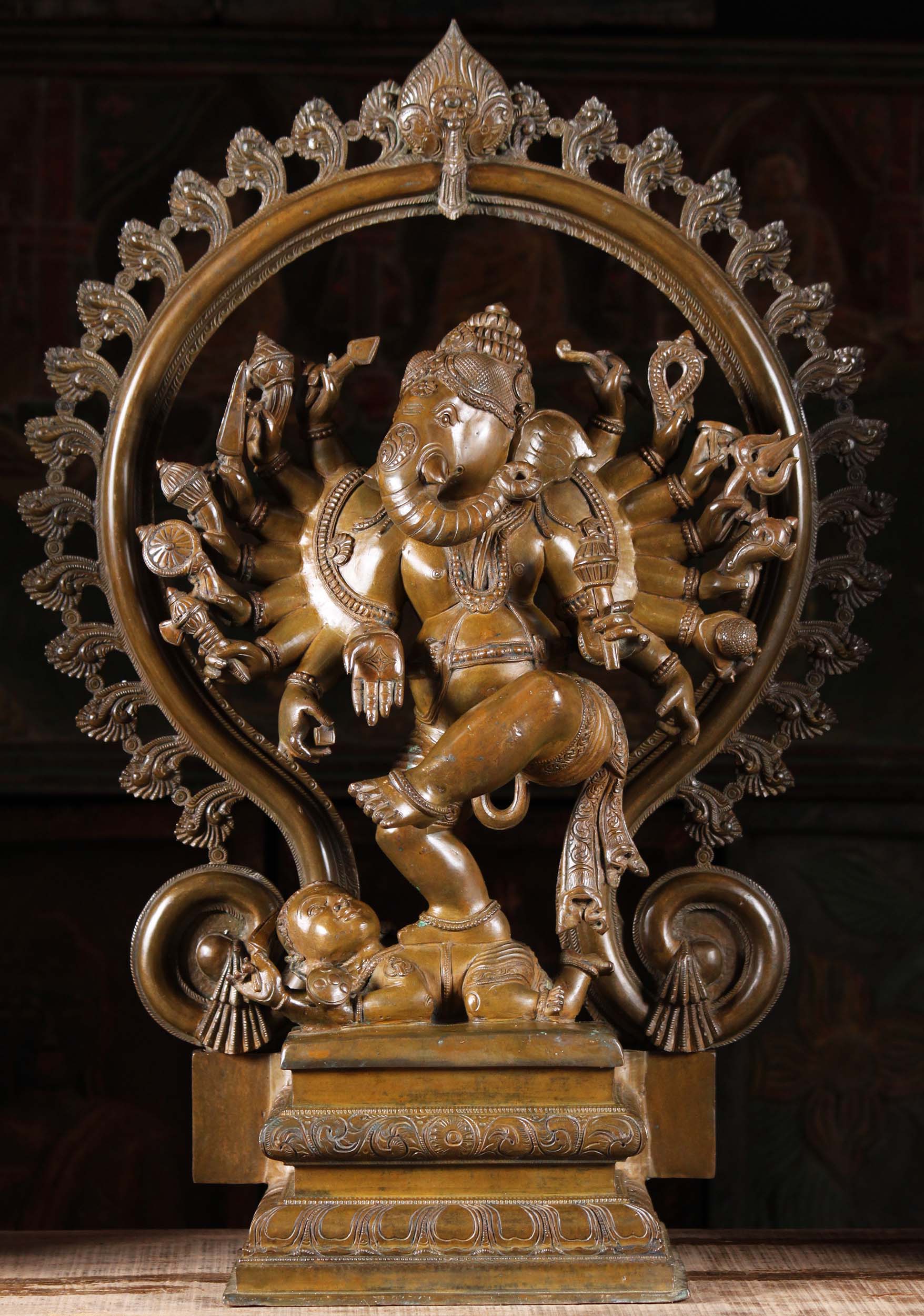 Bronze Nataraja Ganesh Dancing on Apasmara the Dwarf with 16 Arms & Peacock Tail Arch 26"