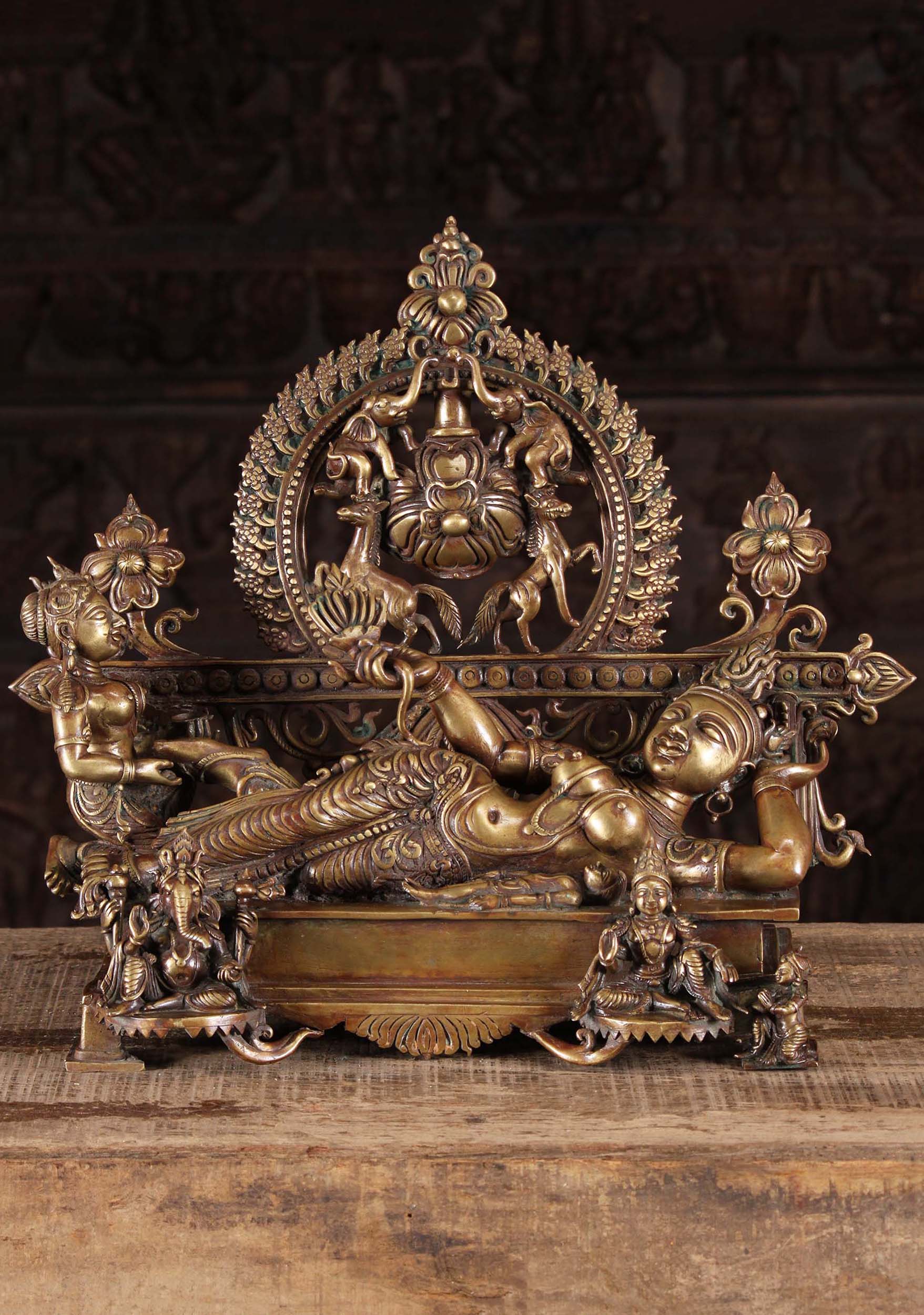 Bronze Sculpture of Hindu Goddess Parvati Laying in Full Repose with Ganesh & Murugan 16"