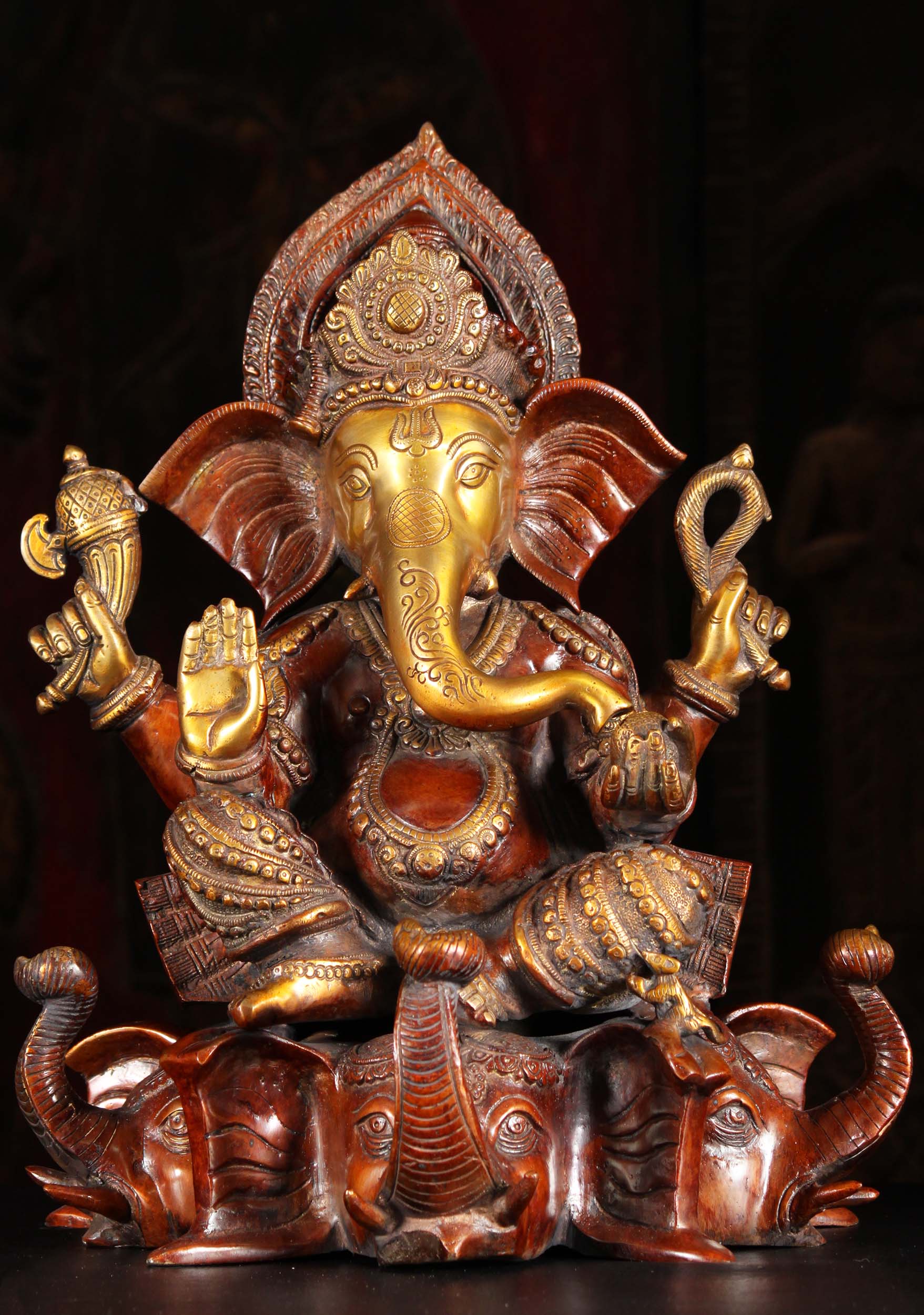 Brass Ganesh Seated on 3 Elephant Head Base 17"