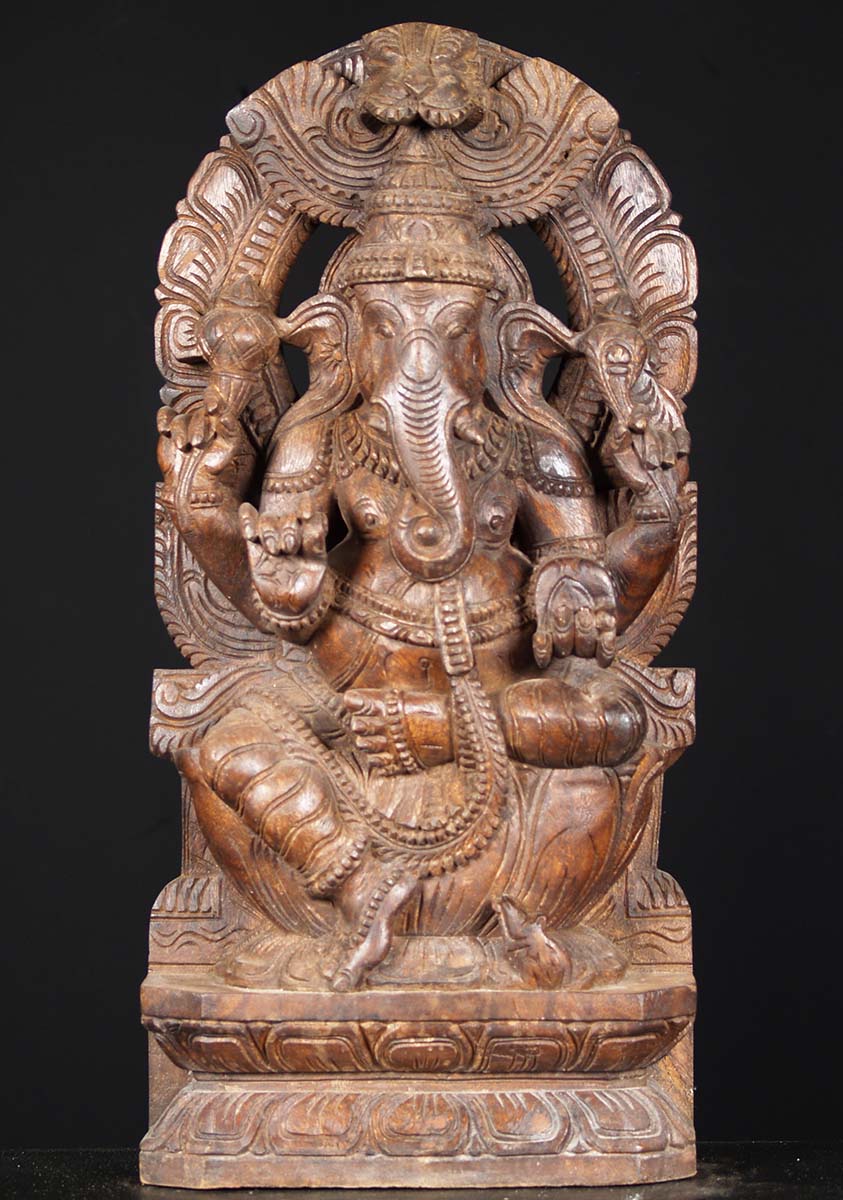 SOLD Wooden Ganesh Seated With Arch 24