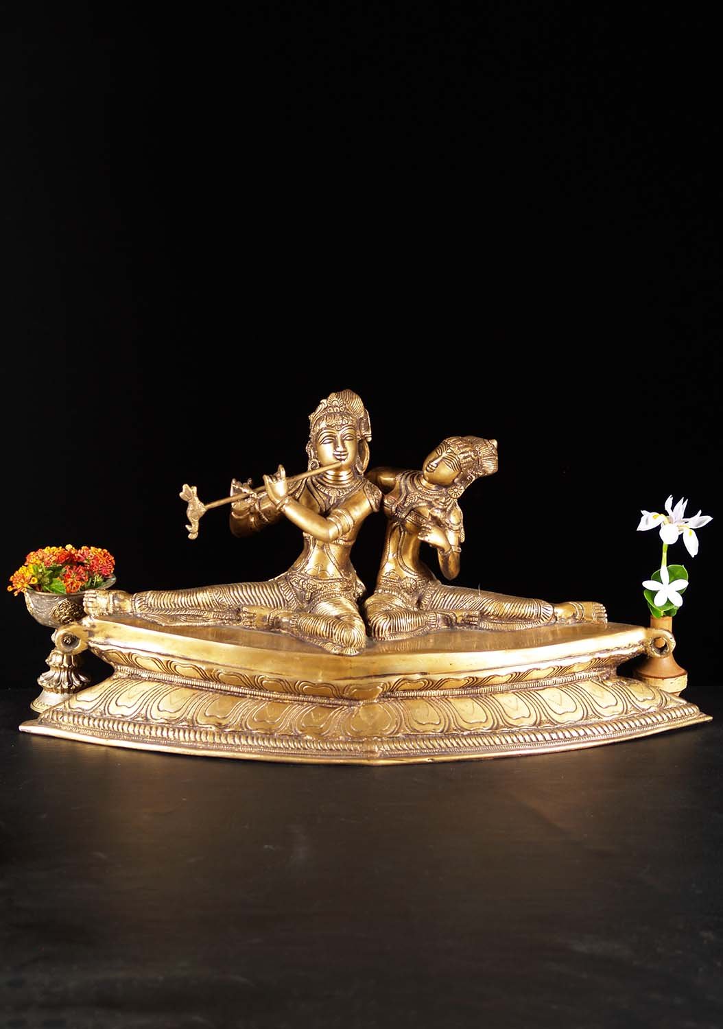 Brass Statue of the Lovers Gopal Krishna & Radha Seated on Long Diamond Shaped Base 24"