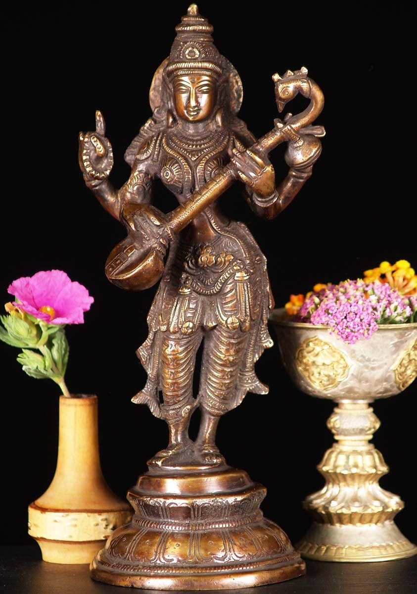 Brass Saraswati Idol the Hindu Goddess of Wisdom Playing a Peacock Headed Veena 11"