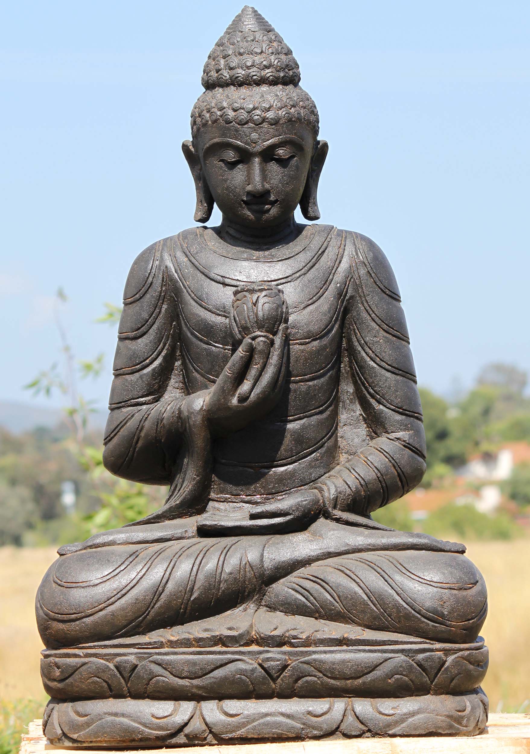 SOLD Stone Buddha Statue Holding a Lotus Flower 38