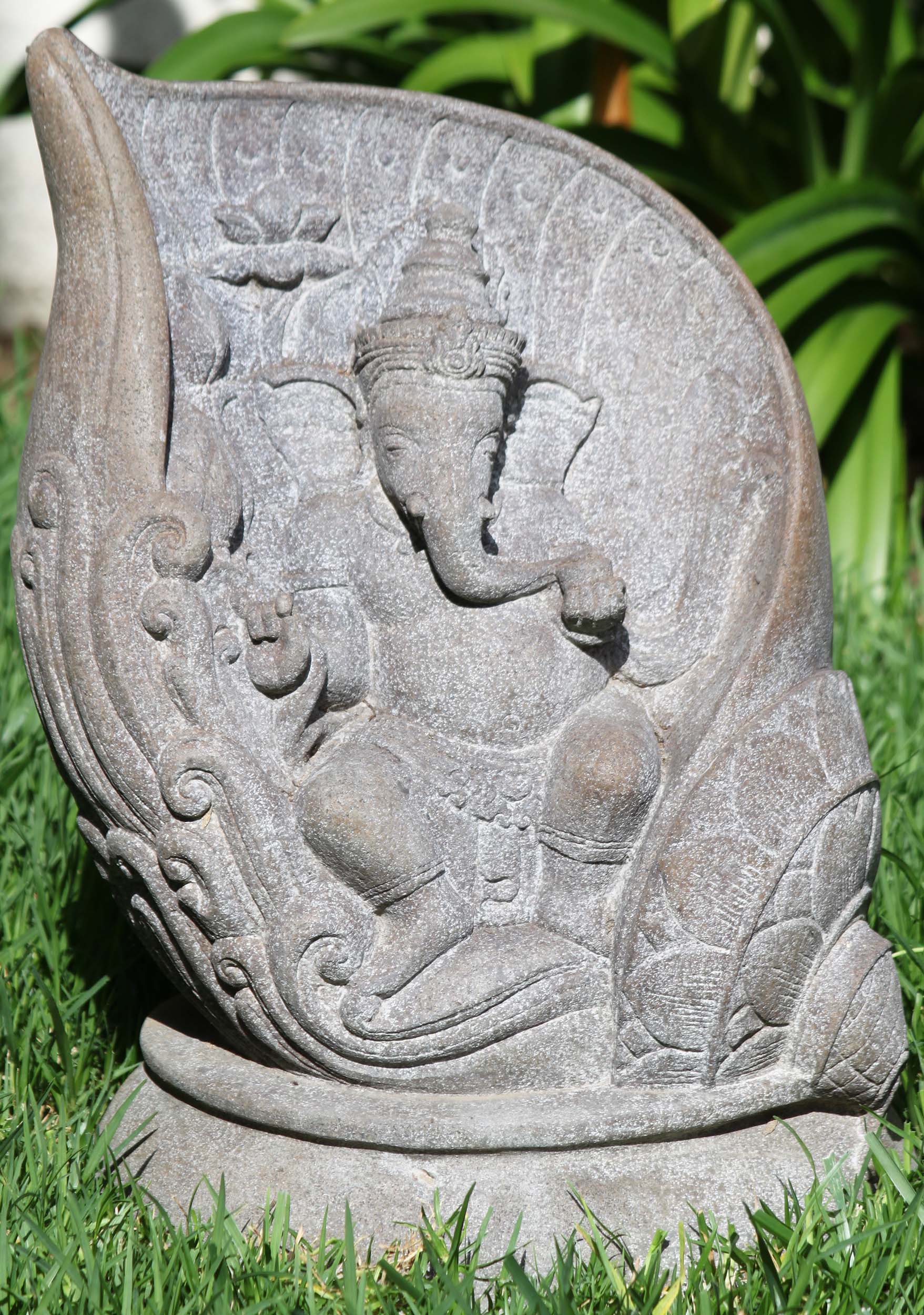 Stone Ganesha Dancing within Conch Shell 19"