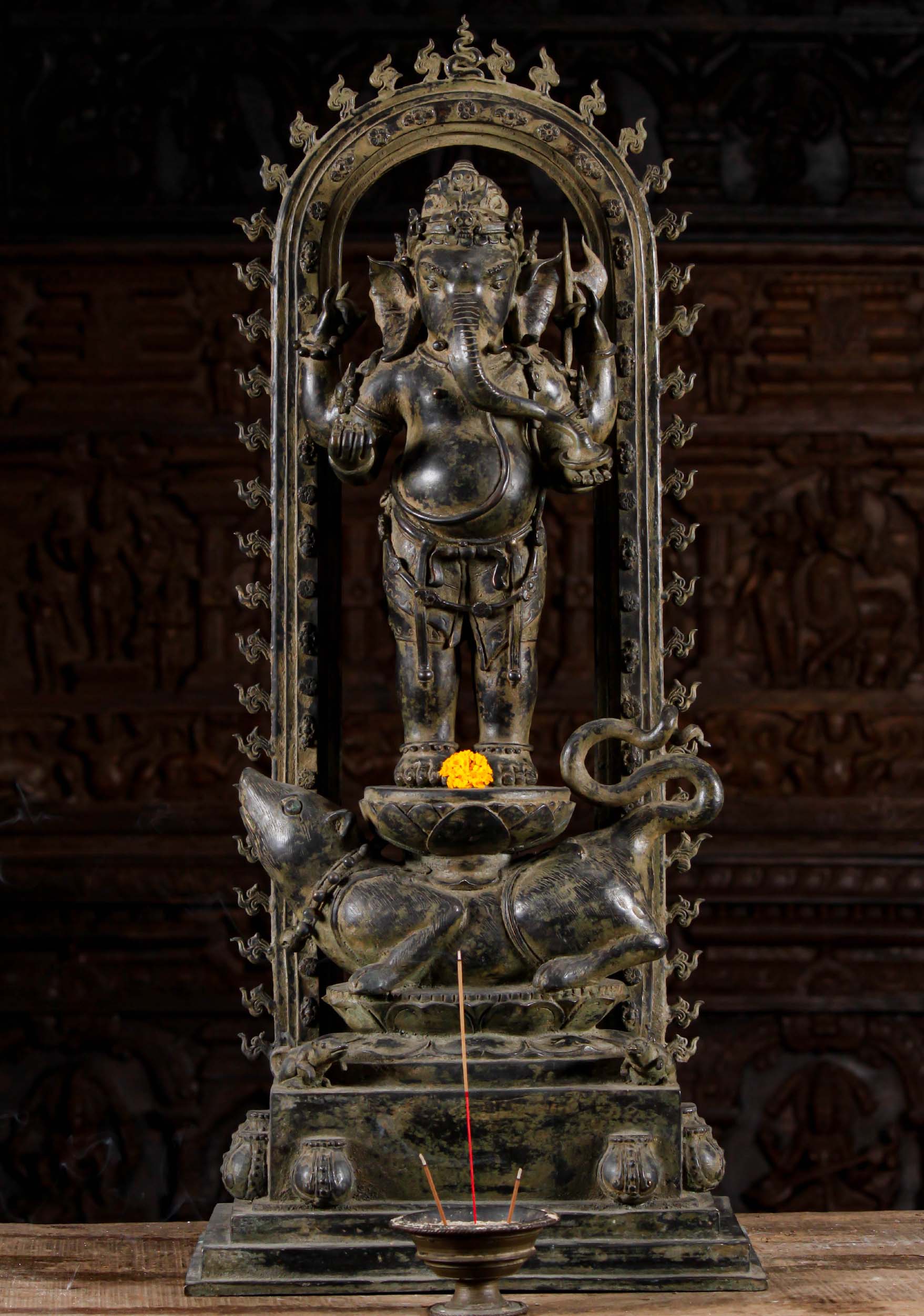 Indonesian Brass Ganesh Statue Standing on a Large Rat with Flaming Arch Surrounding Him 34"