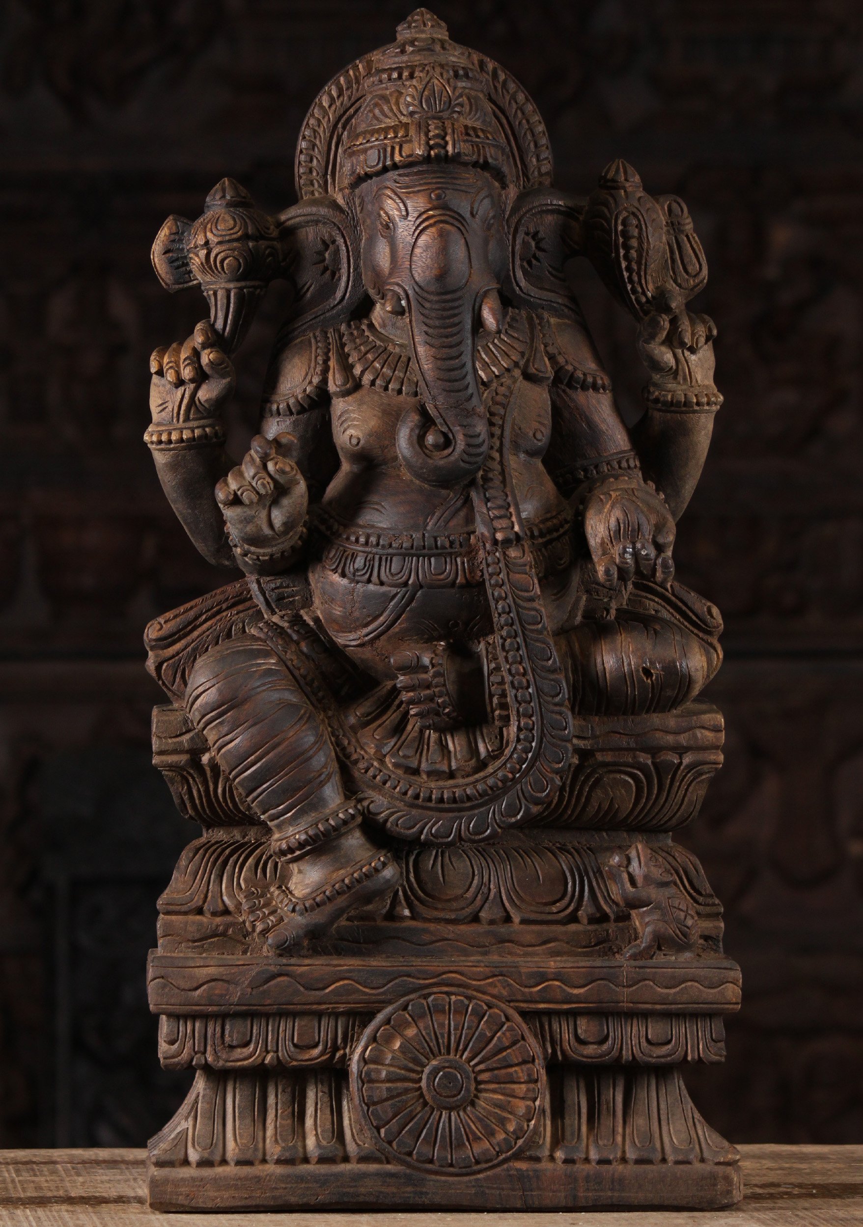 Dark Wood Seated Ganesh Statue Holding Tusk  24"