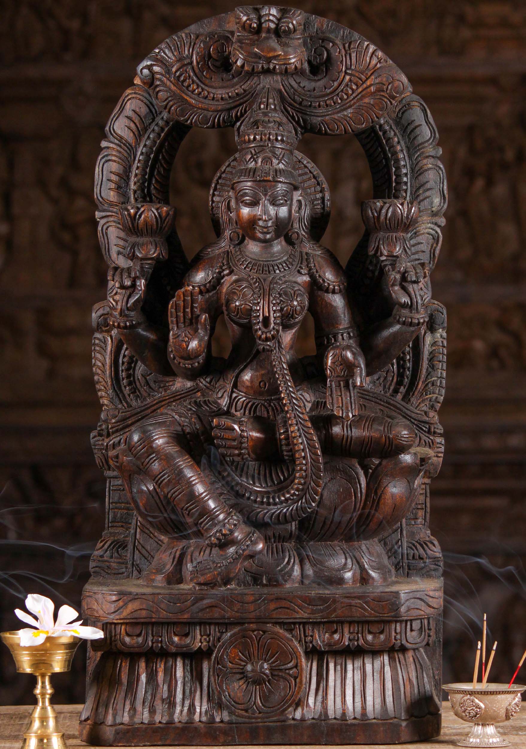 Wood Lakshmi Seated Beneath Arch Sculpture 24"