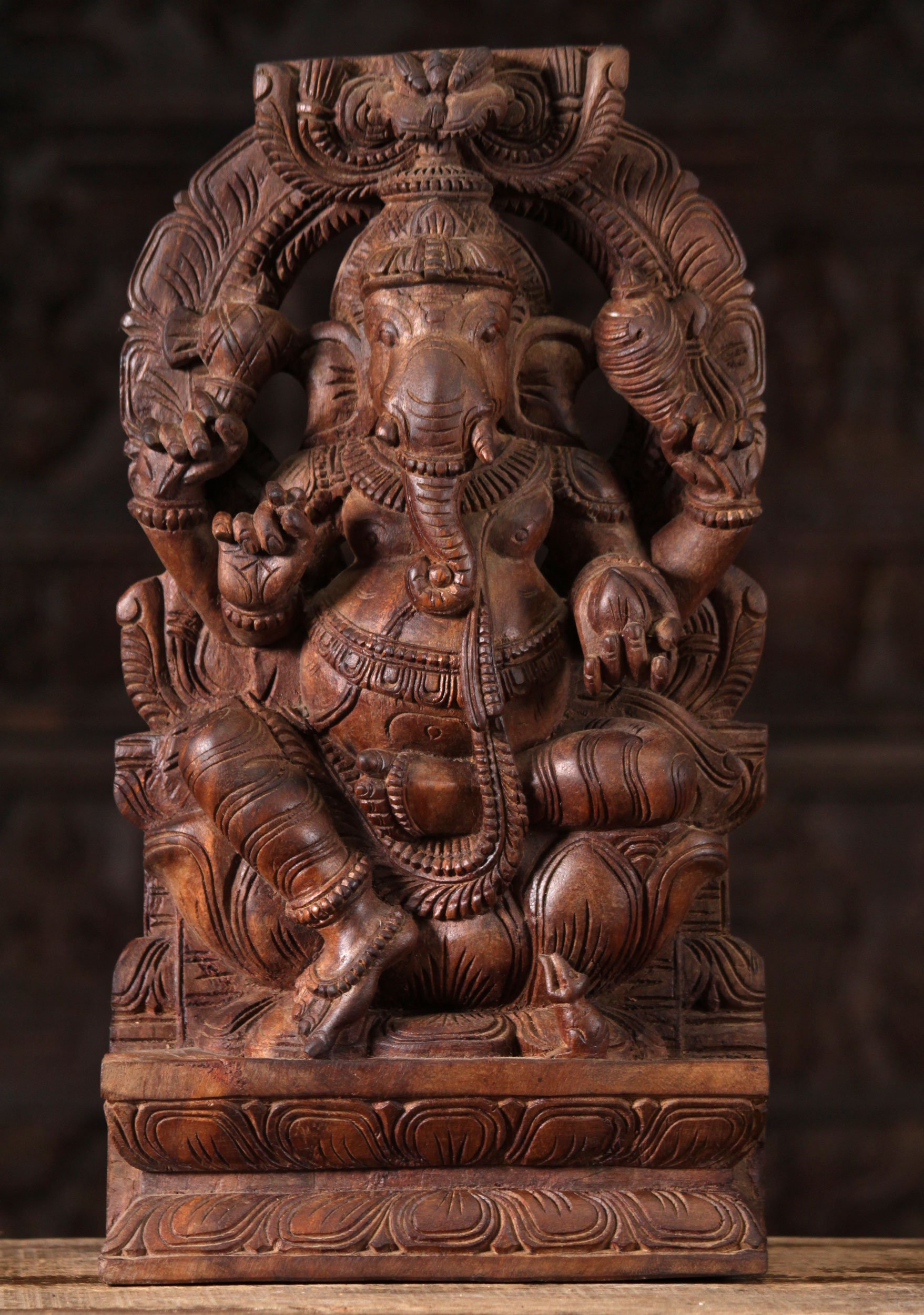 Wooden Ganesha Sculpture Beneath Arch 18"