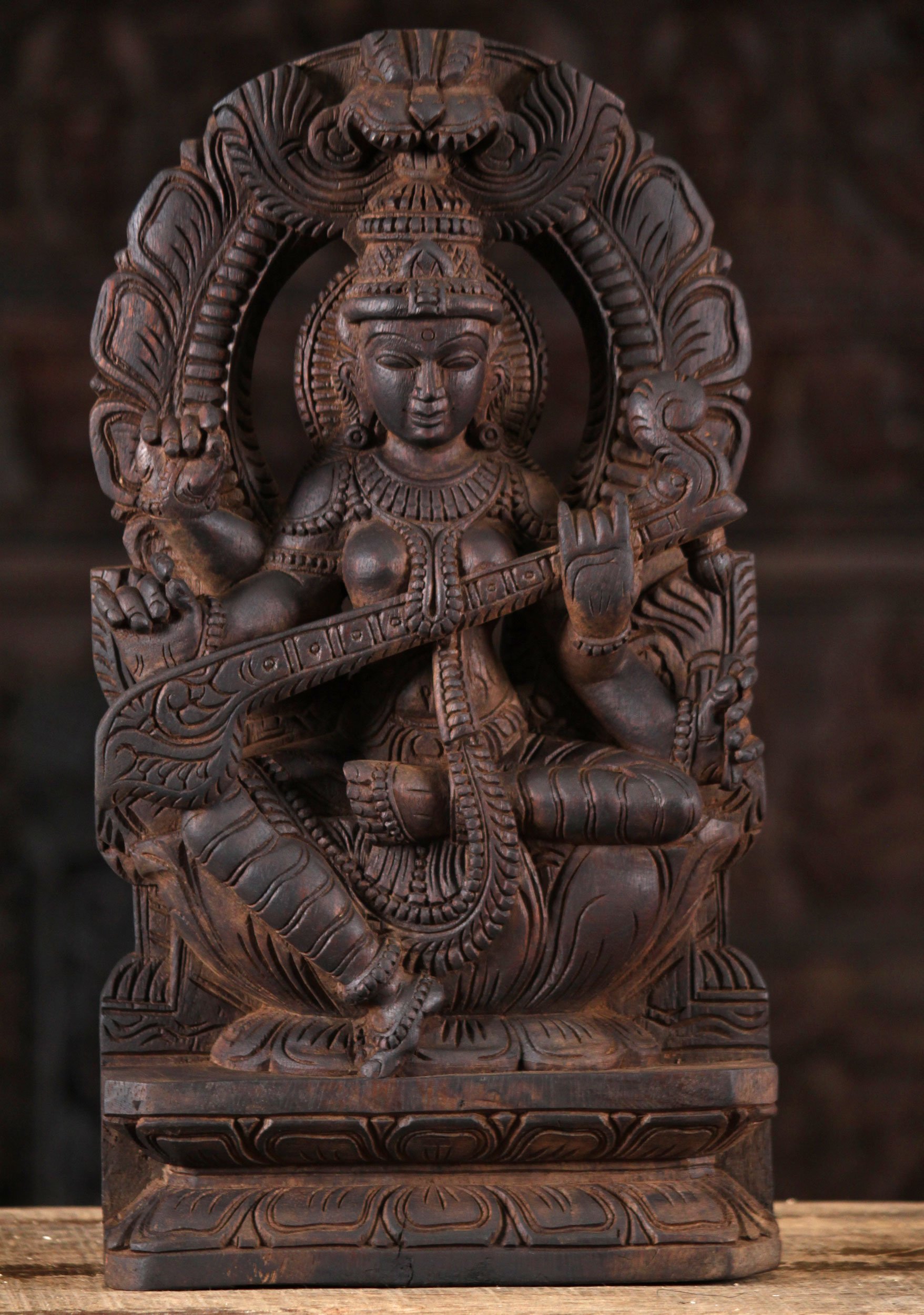 Wood Saraswati Playing Veena Beneath Arch 18"