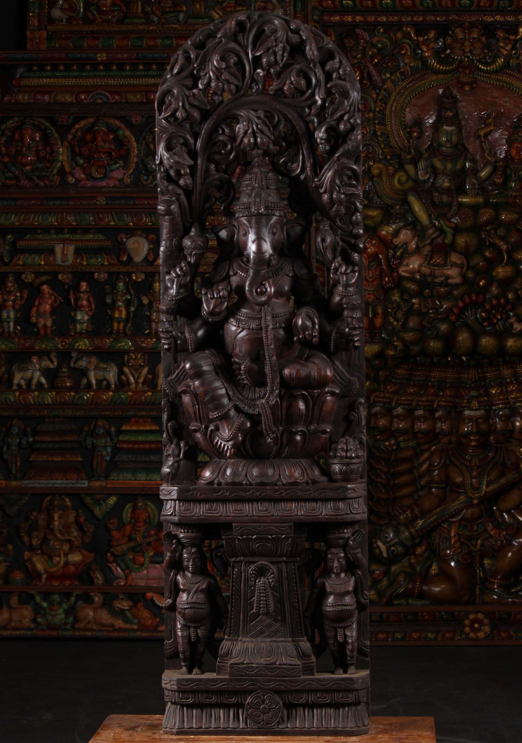 Wooden Ganesha Seated on Double Lotus Base Beneath Tall Lush Canopy with Six Arms 60"