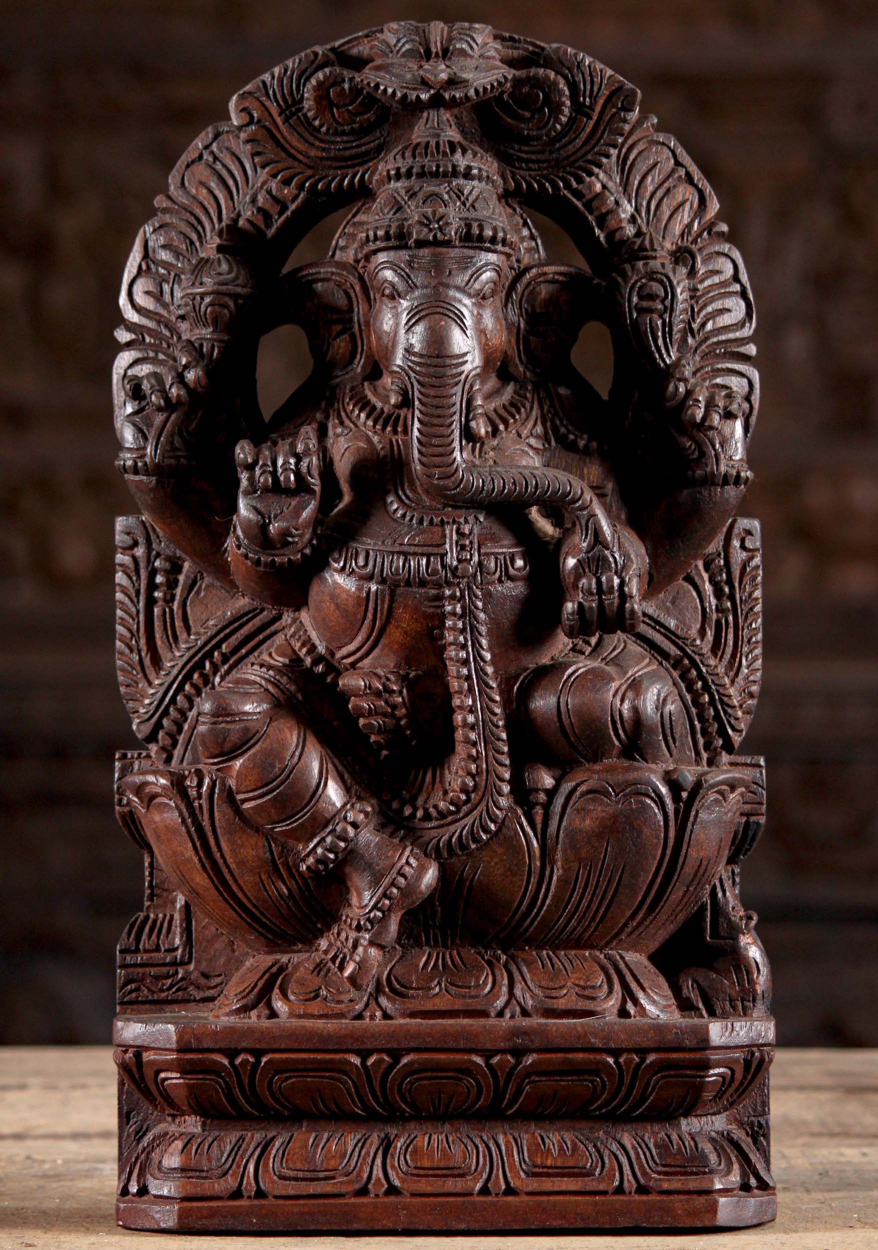 Wooden Ganesha Seated Under Arch with Tusk 18"