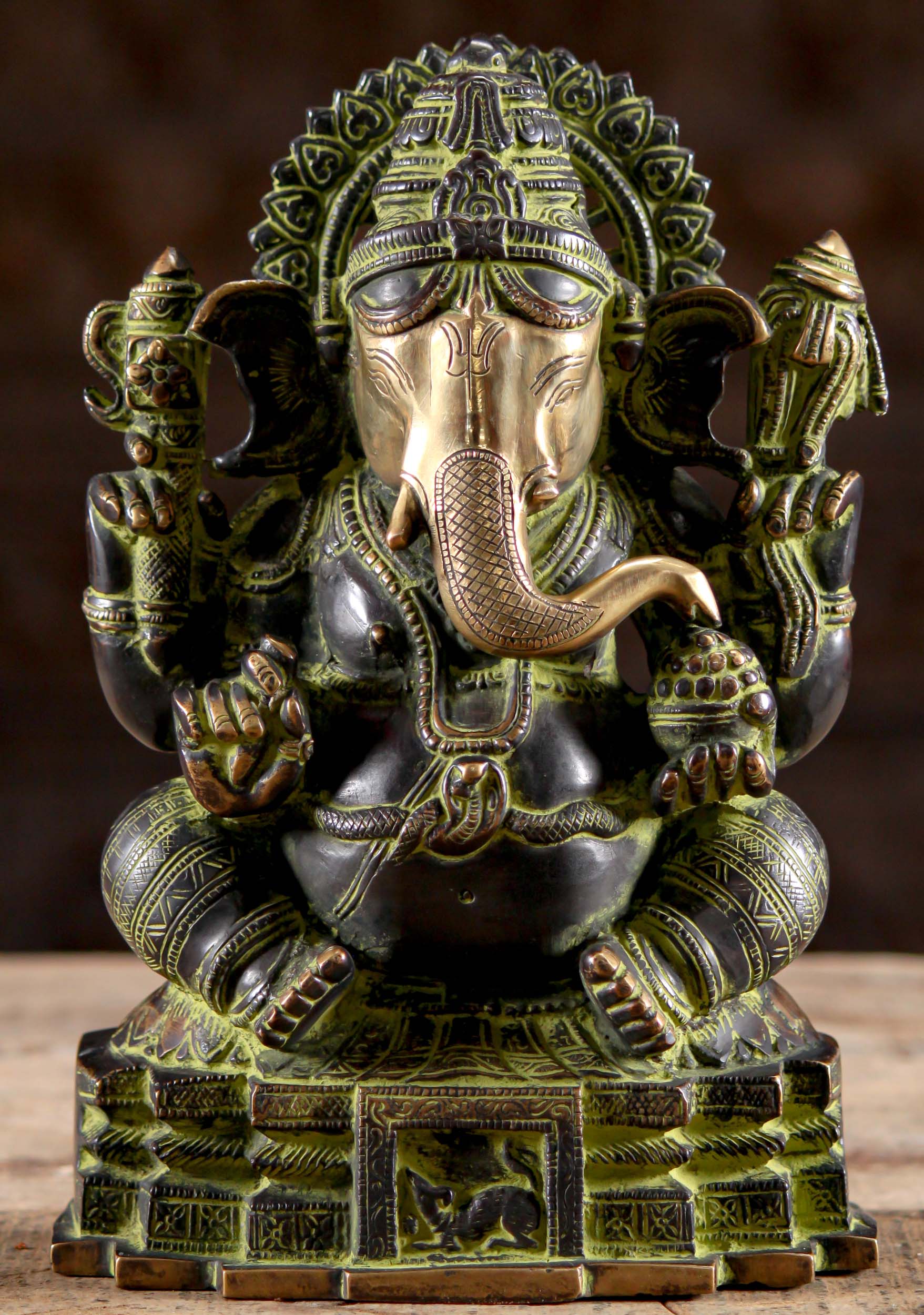 Brass Ganesha Wearing Cobra Belt Seated on Mooshika Throne with Bowl of Laddus 11"