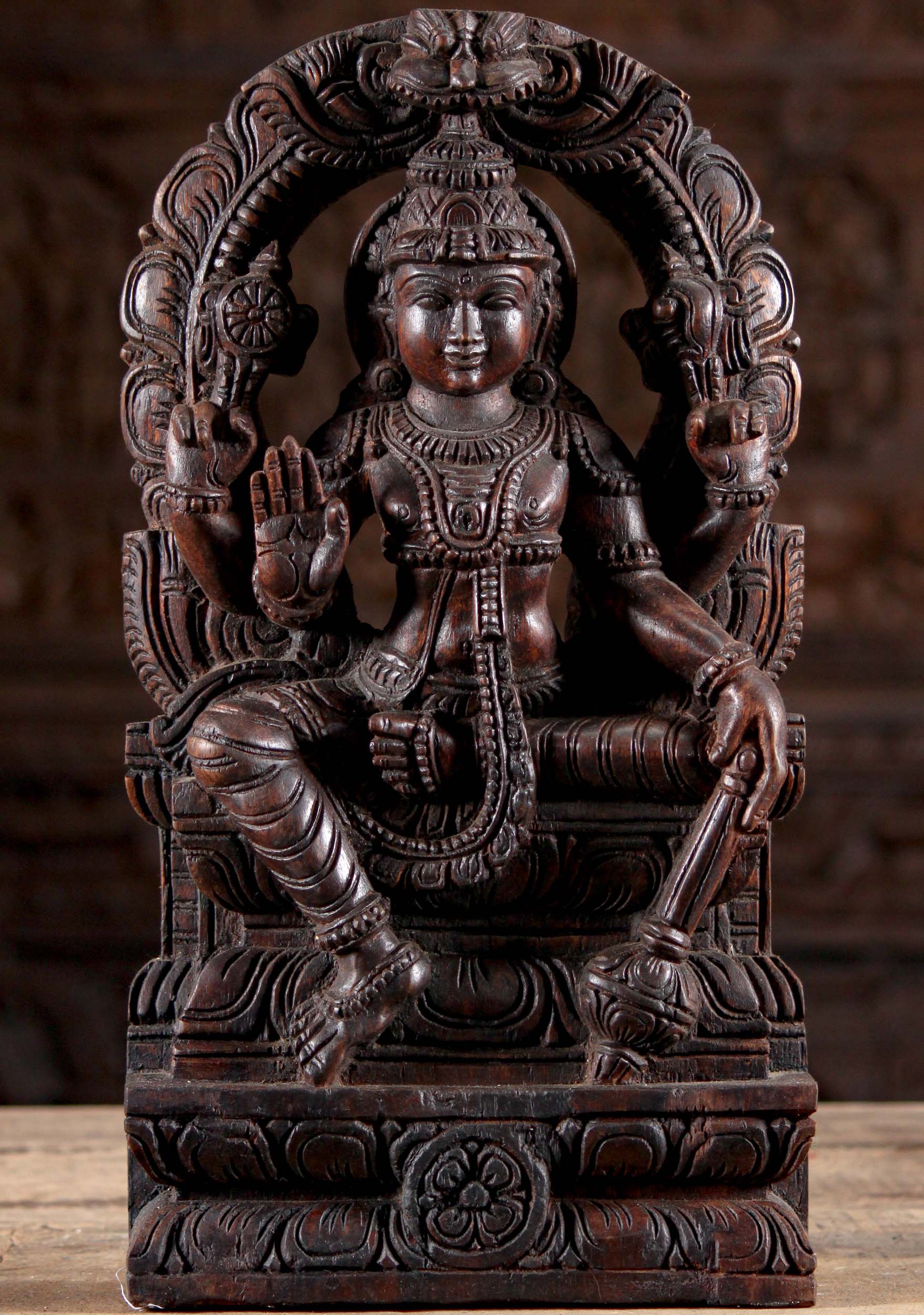 Wood Seated Vishnu with Club Beneath Arch 18"