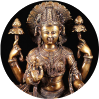Statue of goddess Lakshmi holding lotus flowers
