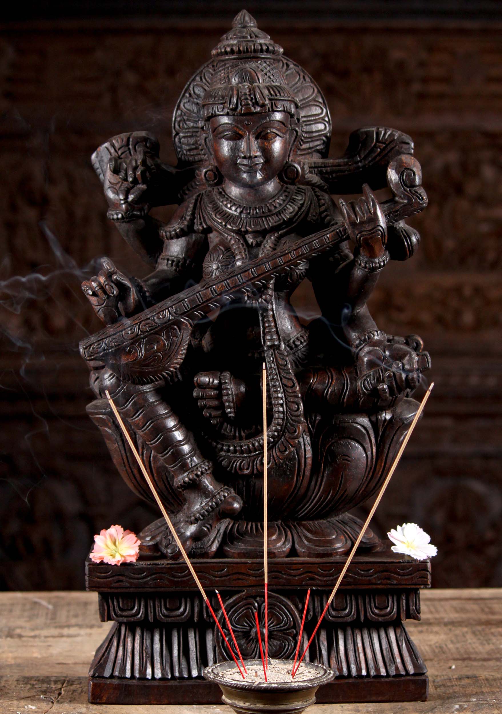 Wooden Hand Carved Sculpture of Hindu Goddess of Wisdom Saraswati Playing the Veena on Lotus Ba