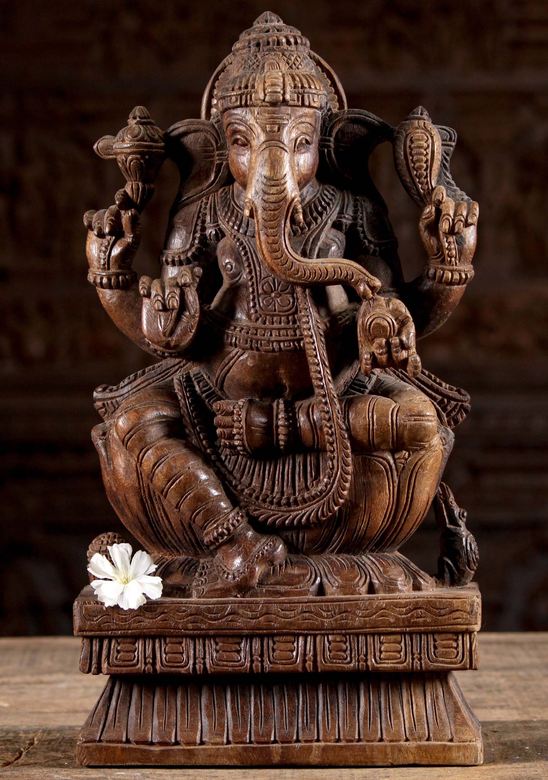 Wooden Ganesh Holding Mango Sculpture 18"