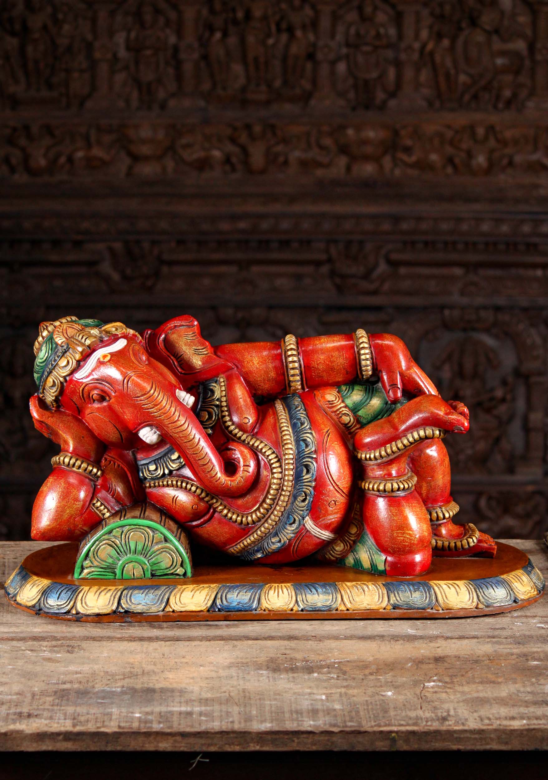 Wooden Red Painted Ganesh Statue in a Completely Relaxed Pose Reclining on a Pillow 27"