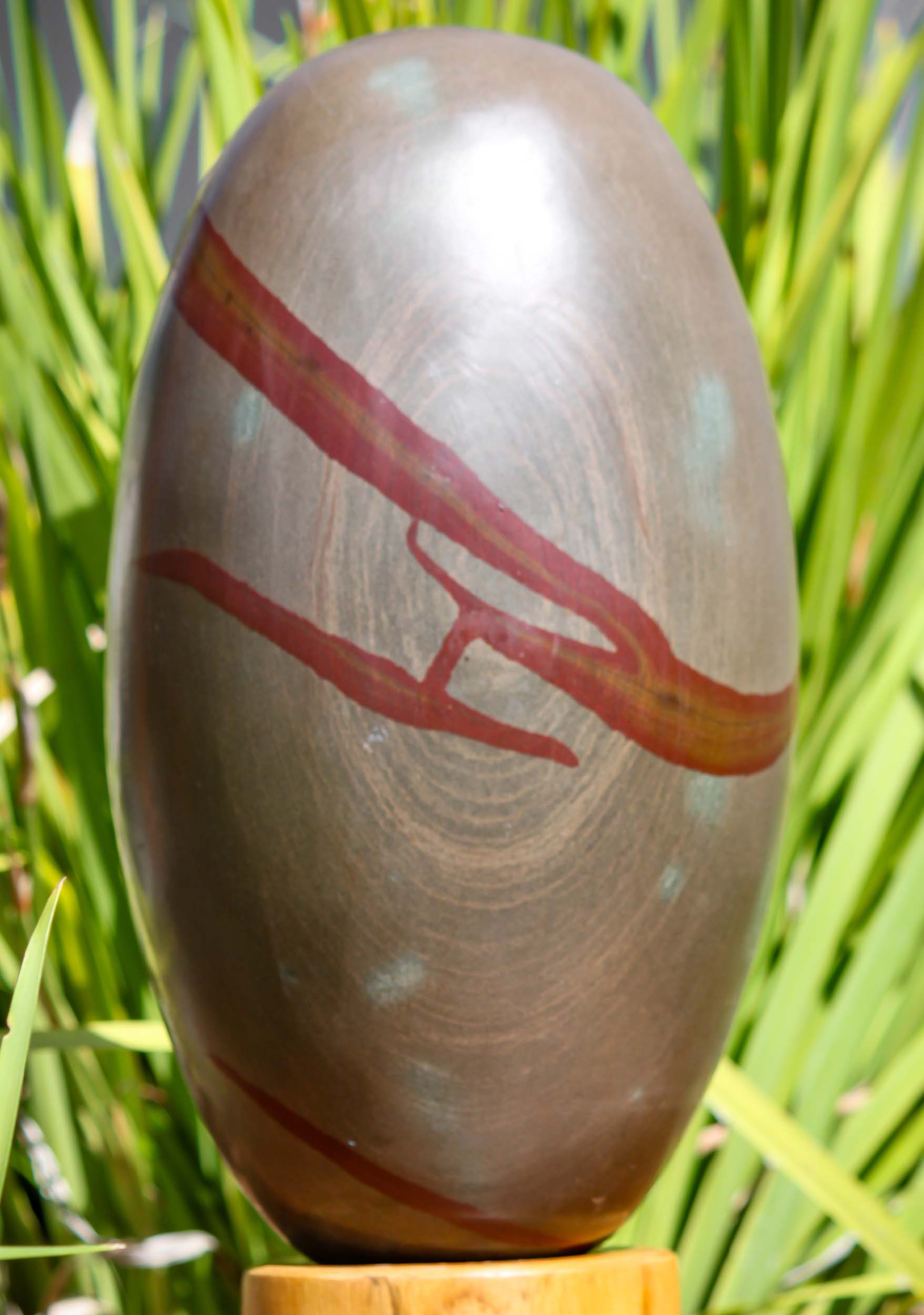 Grey Stone with Red Lines Narmada Shiva Lingam Representing Shiva as a Pillar of Fire 13.5"