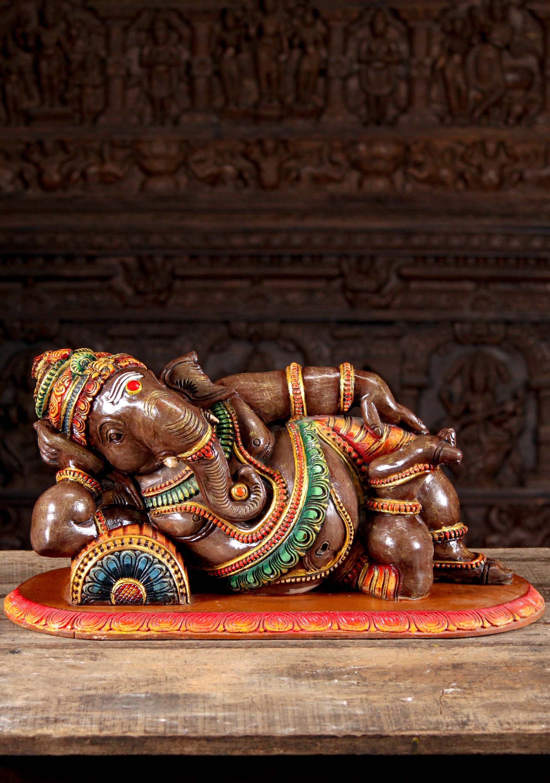 Wooden Brown Painted Ganesh Statue in a Completely Relaxed Pose Reclining on a Pillow 26"