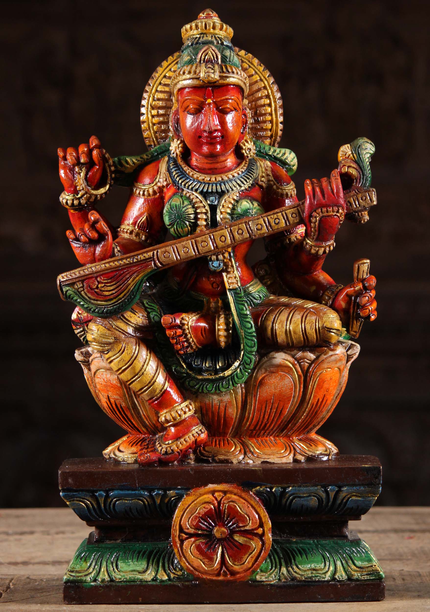 Red Painted Saraswati Statue Seated on Lotus Base Playing the Veena 18"