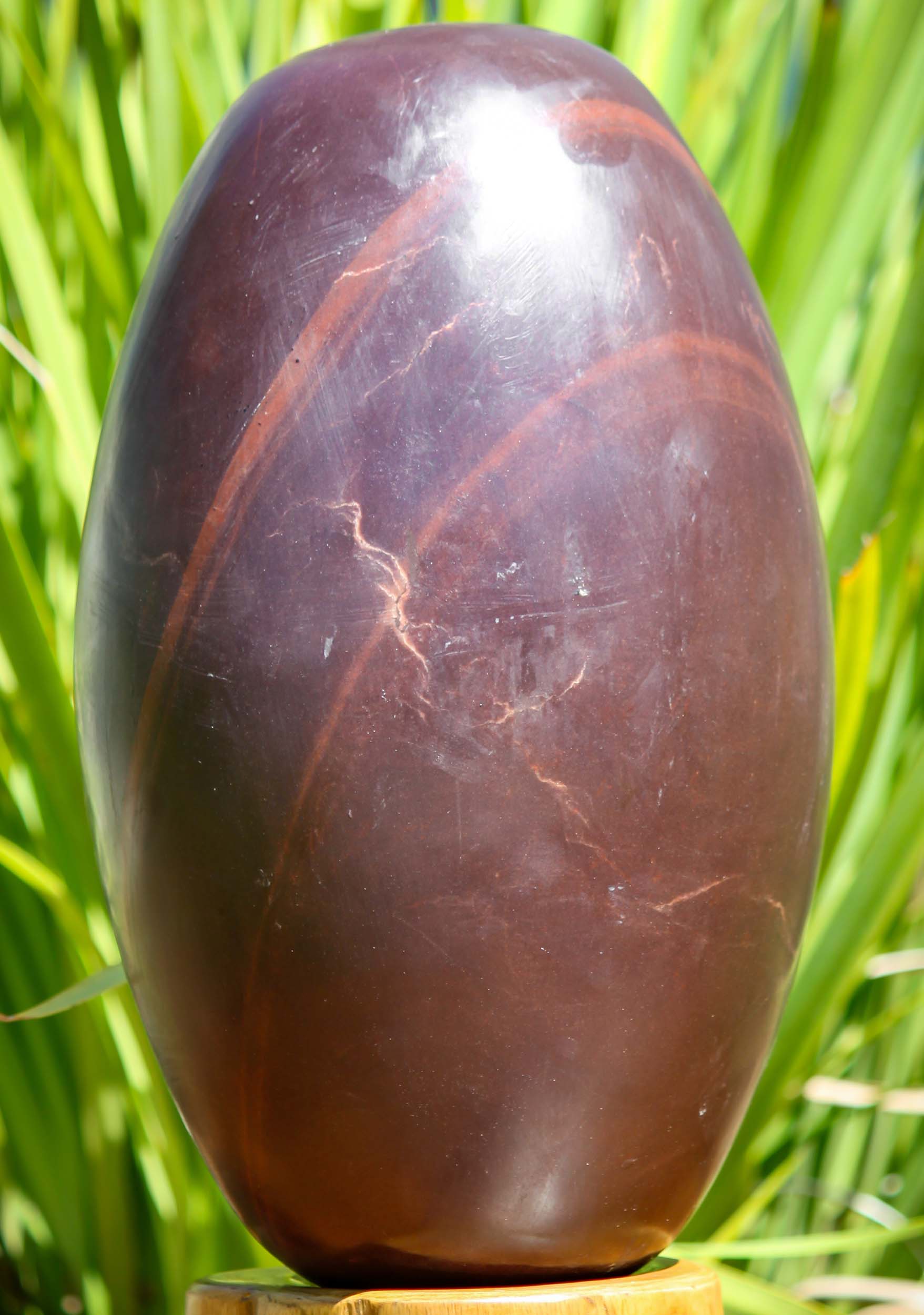 Deep Red and Purple Narmada Shiva Lingam with Lines Representing Shiva as a Pillar of Fire 12"