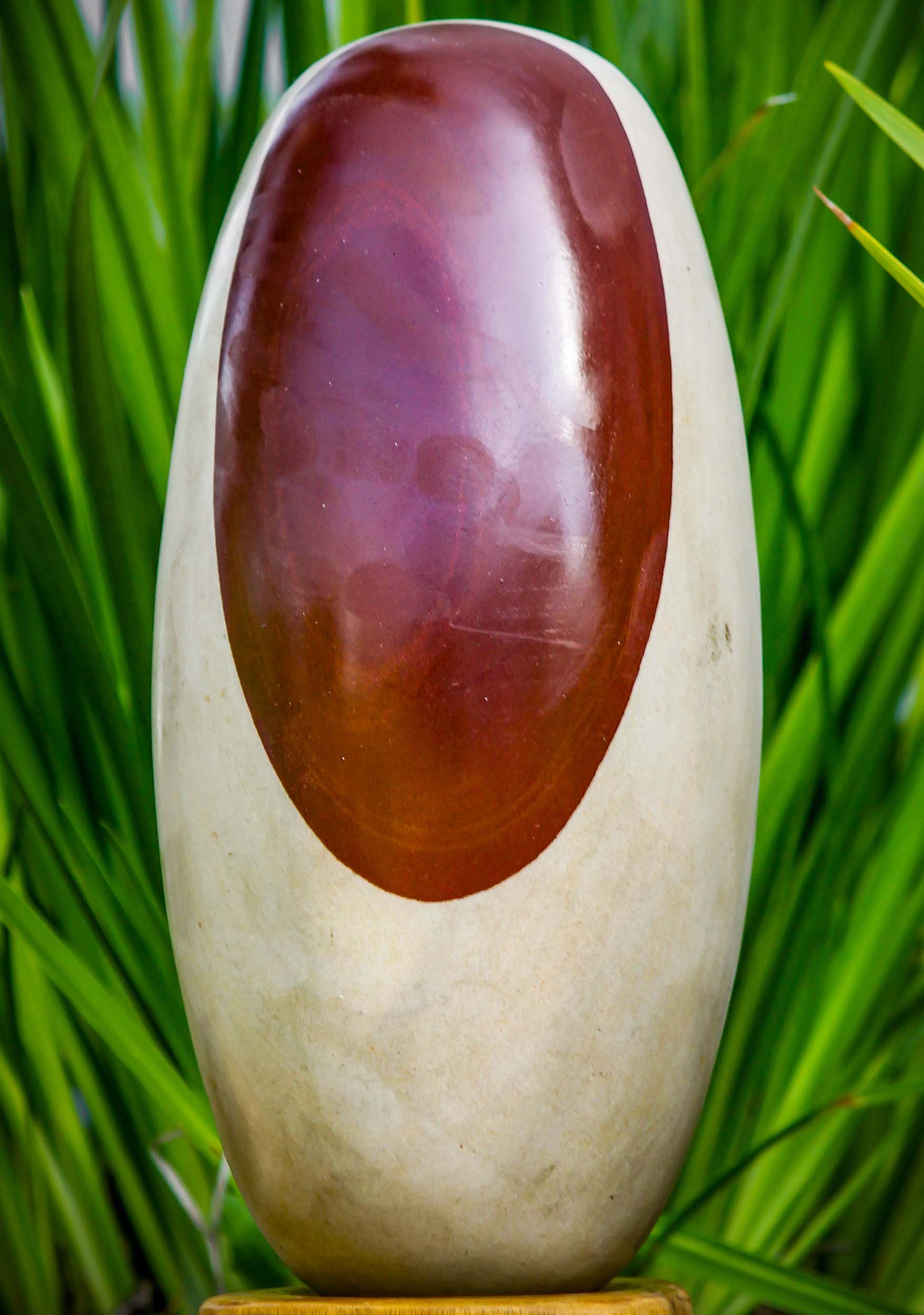 Light Narmada Stone Shiva Lingam with Deep Red Spot Representing Shiva as a Pillar of Fire 12.5