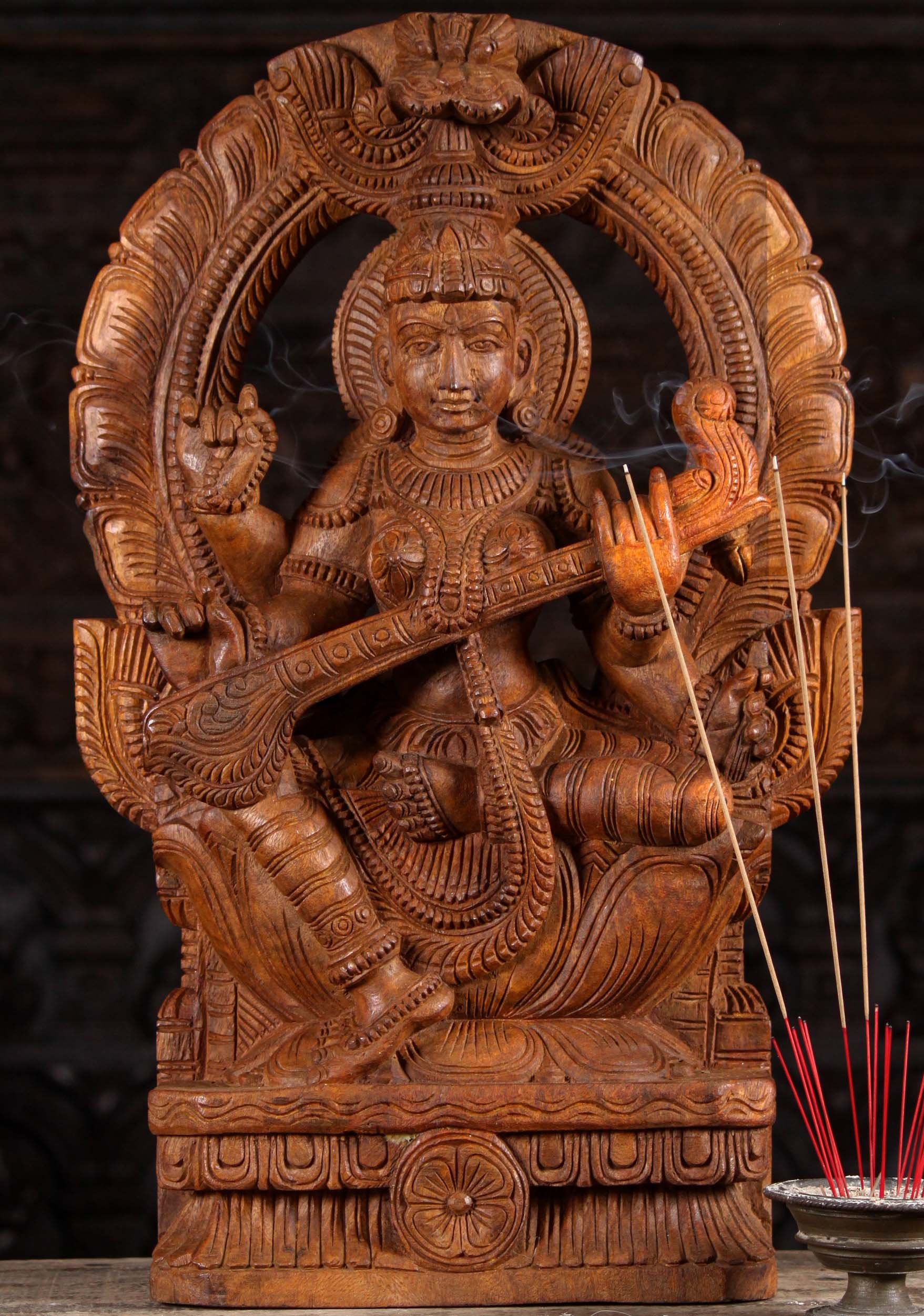 Wooden Seated Hand Carved Saraswati Statue Playing the Veena Under Mahakala Arch 24"