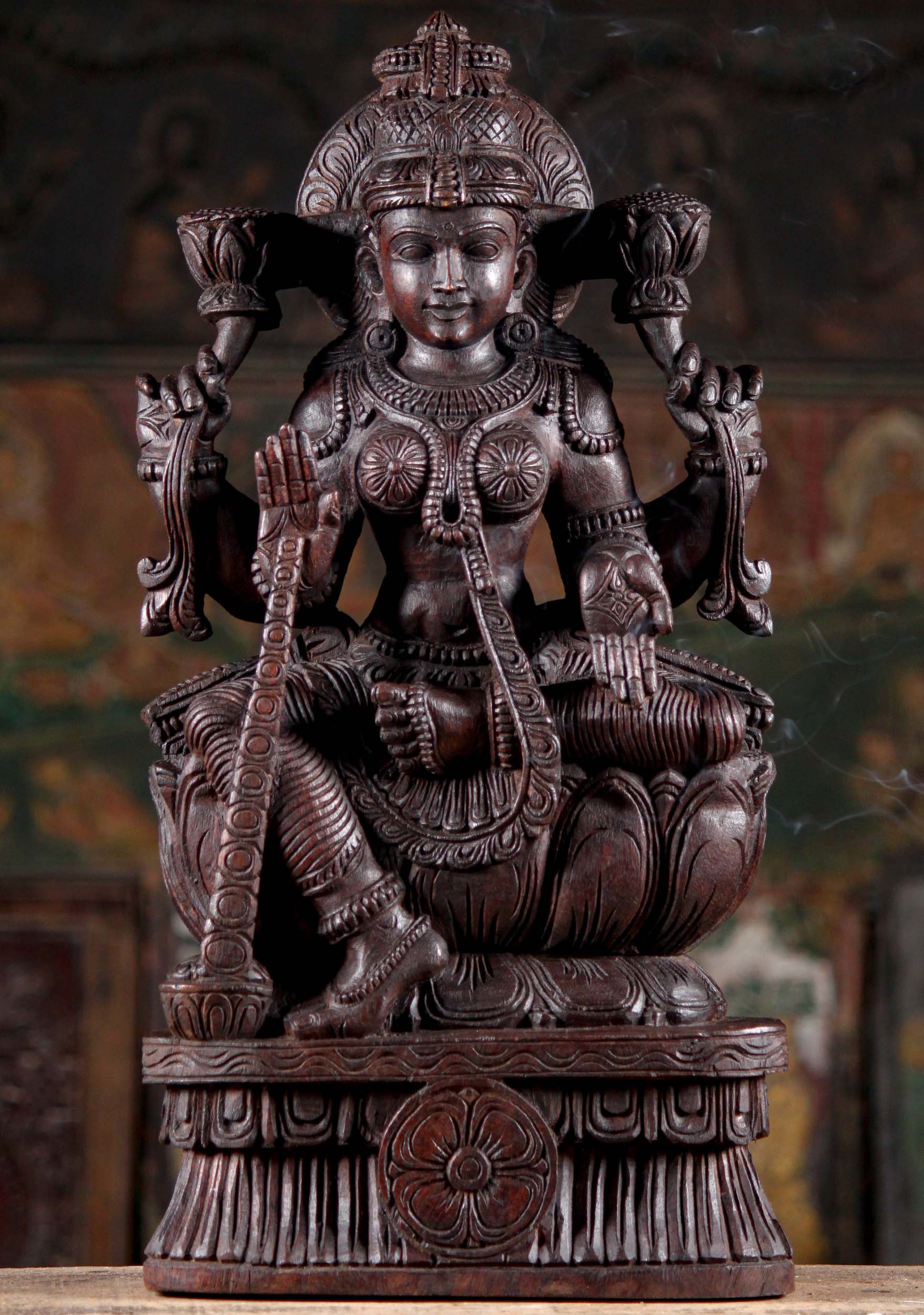 Wooden Seated Lakshmi Sculpture Holding Two Lotus Flowers Granting Boons with Coins 24"