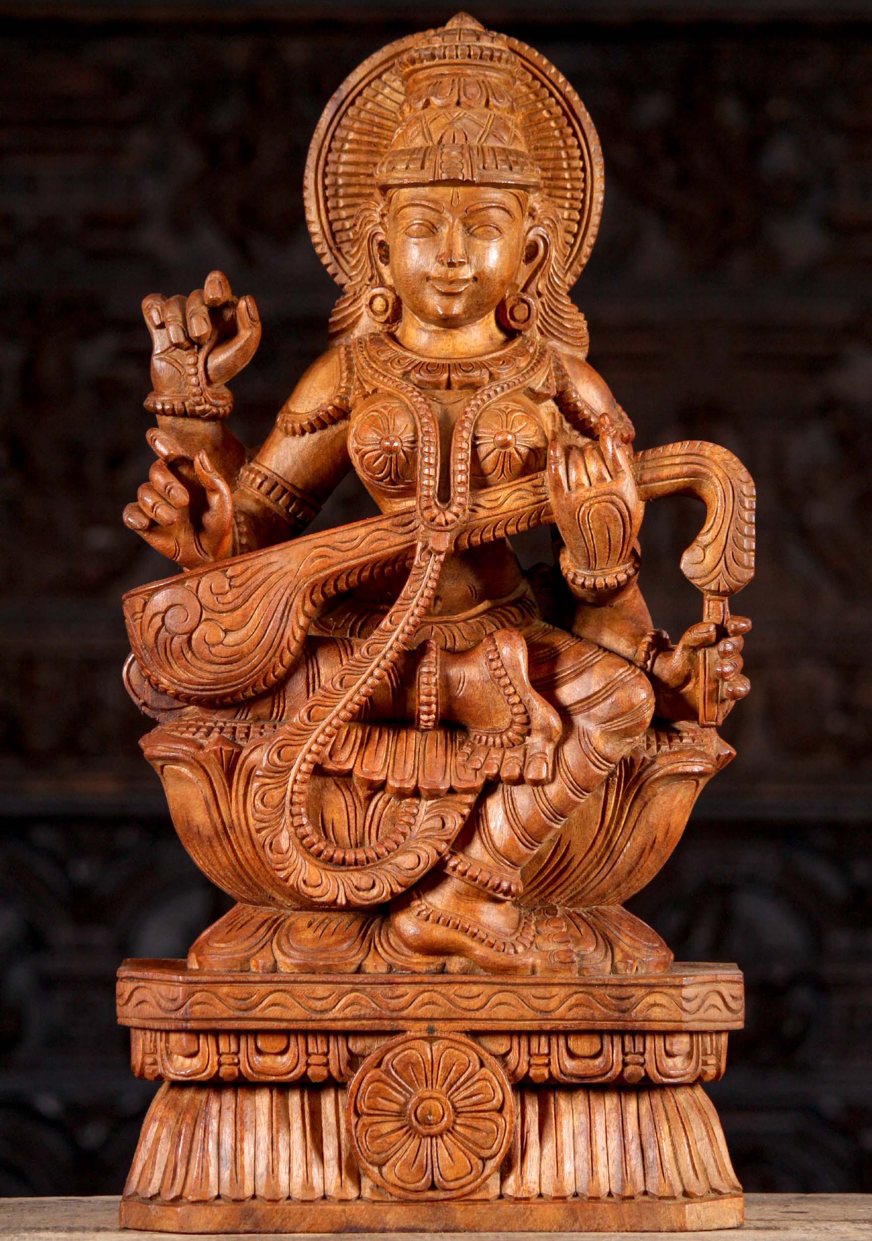 Wooded Hindu Goddess Saraswati Sculpture Seated on a Lotus Base Playing the Veena Statue 24"