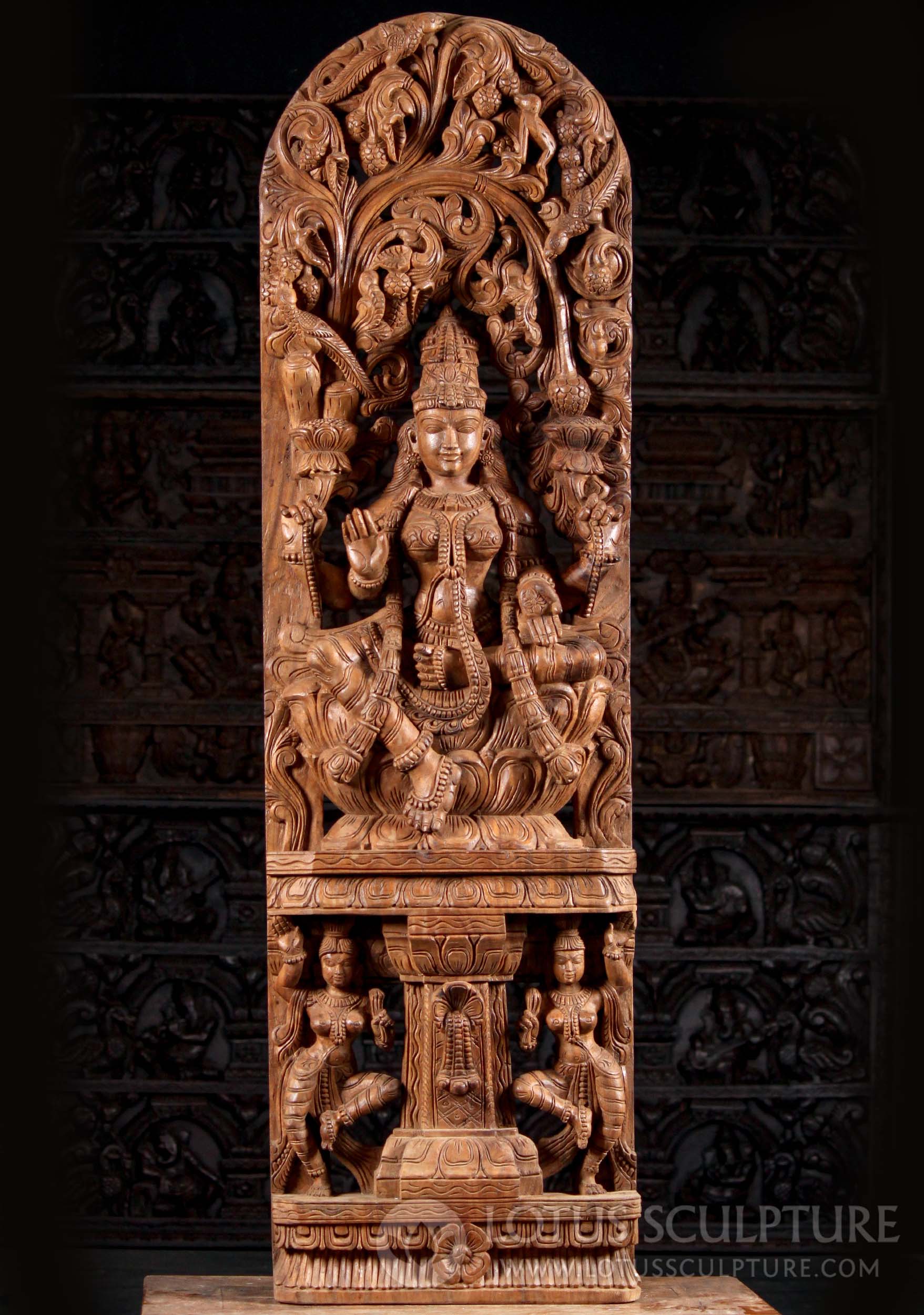 Light Wood Seated Abhaya & Varada Mudra Lakshmi Beneath Lush Canopy 60"