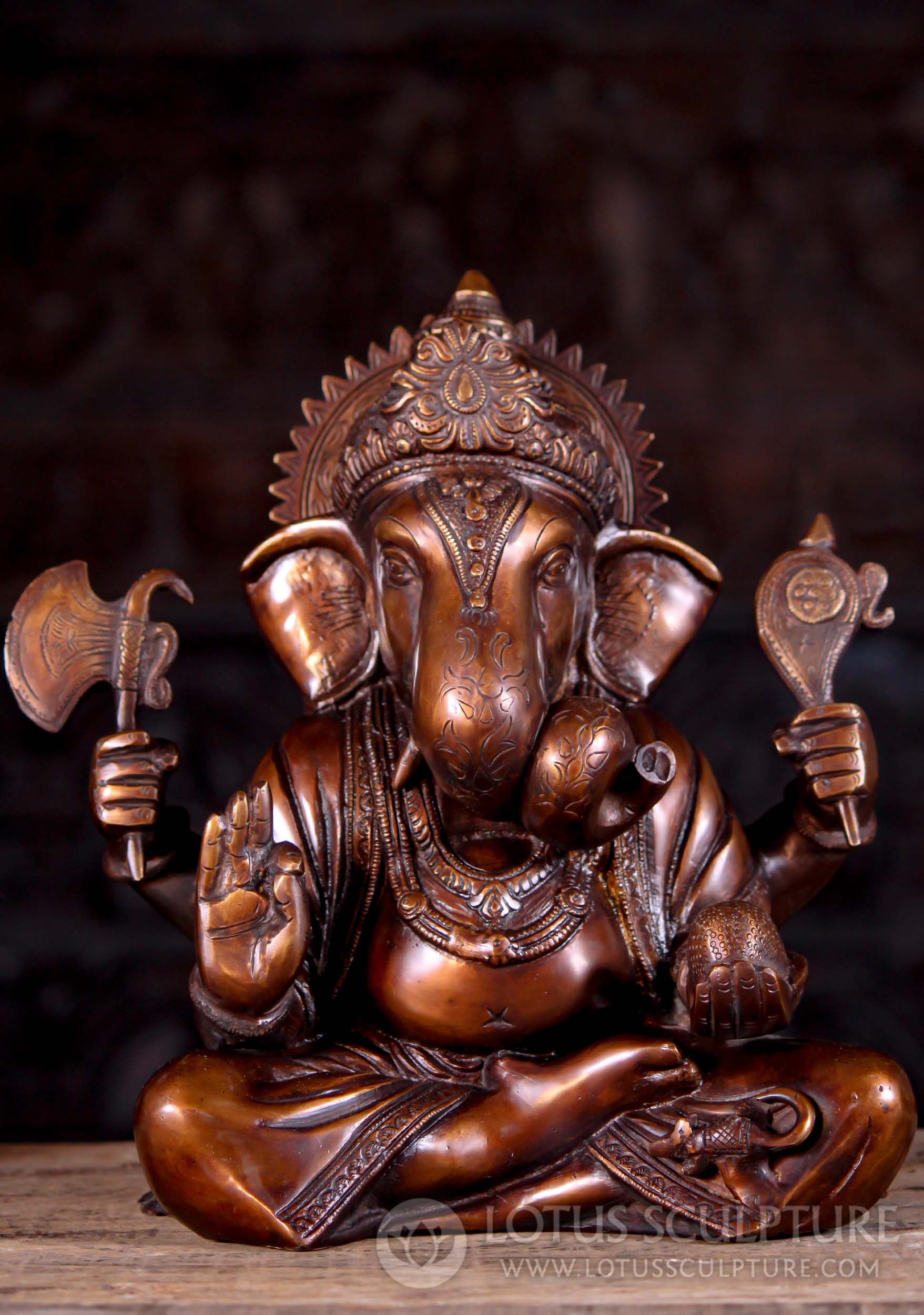 Seated Brass Ganesh with Ax, Goad & Spiral Trunk in Ardha Padmasana 12"