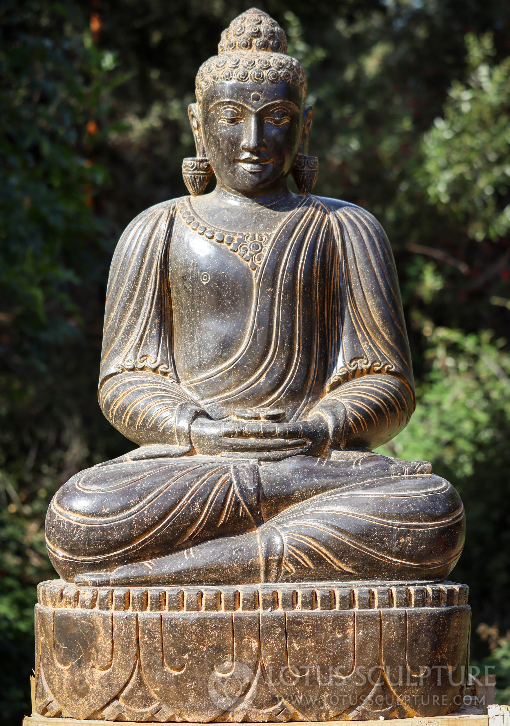 Hand-Carved Lava Stone Buddha Sculpture Holding a Flower on a Lotus Pedal Base 41"