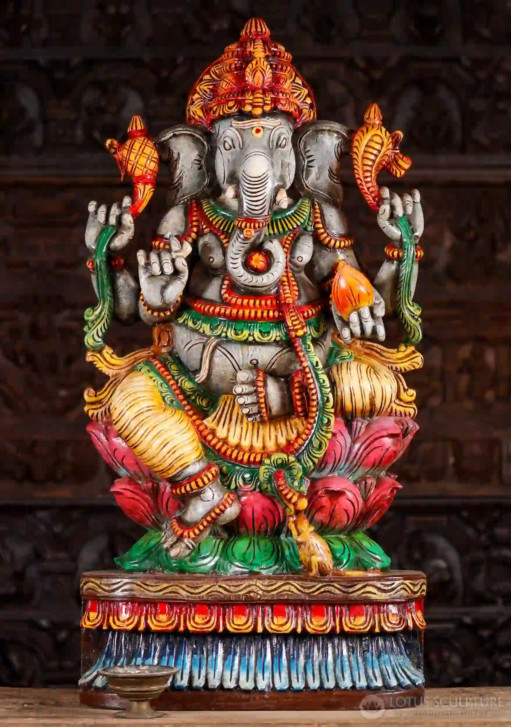 Ganesha Sculpture with Noose, Goad, Tusk, and Mango, Seated on Triple Lotus Base 36"