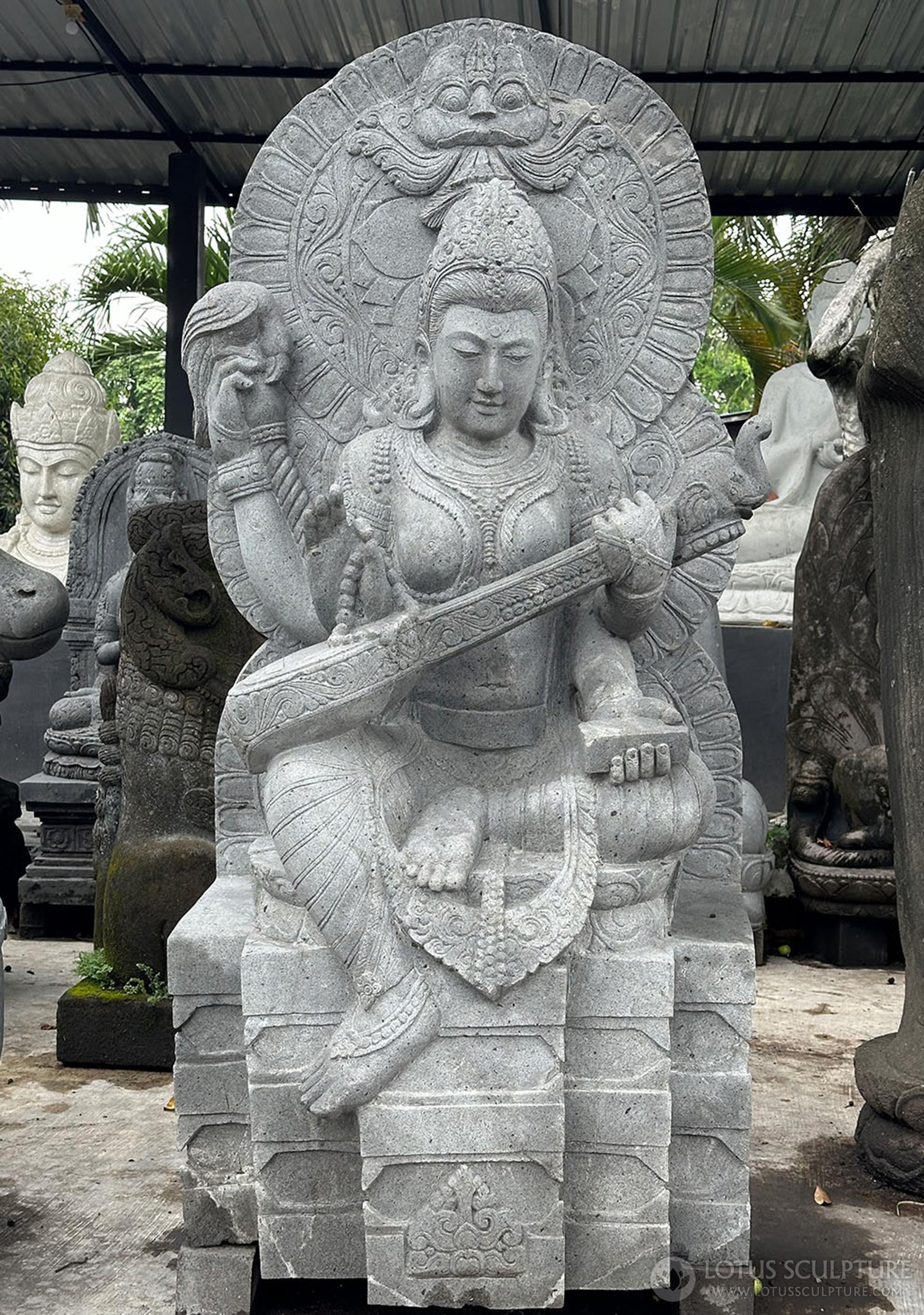 PREORDER Saraswati Garden Sculpture in Hand-Carved Lava Stone with Mahakala Halo 72"