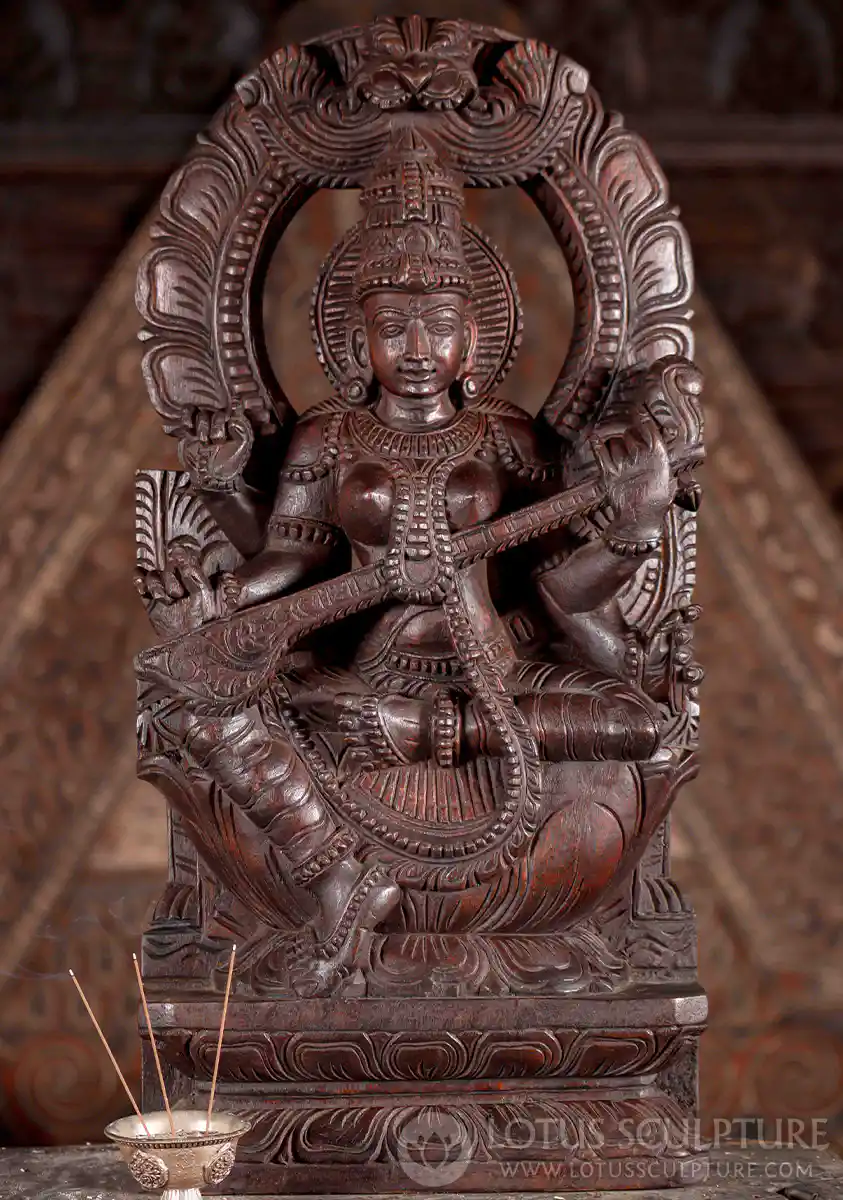 Saraswati Dark Wood Sculpture Under Mahakala Arch Playing Veena with Mala and Vedas 24"